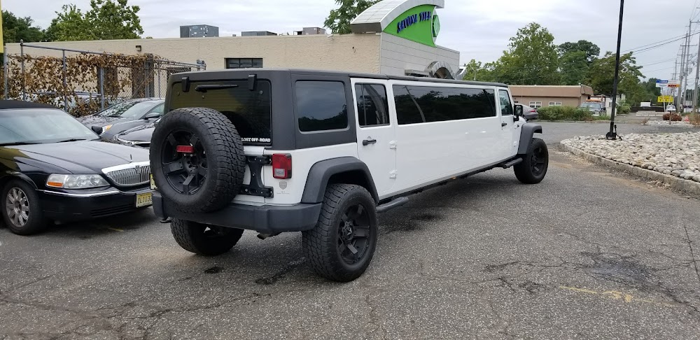 The image showcases a luxury limousine, highlighting its sleek exterior and sophisticated design. This vehicle represents RPD Limousine Service's commitment to providing high-end transportation solutions for clients seeking comfort and style.