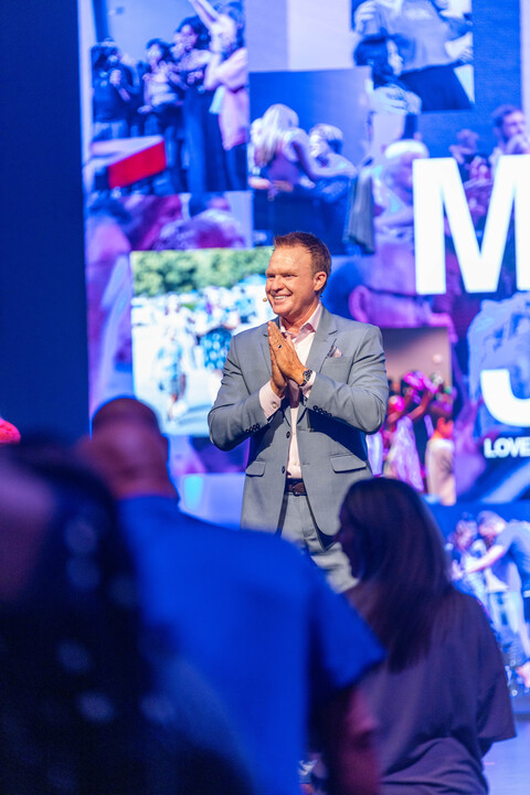 The image captures a group of individuals dressed in formal attire, likely at a church event or convention. This reflects Cornerstone Church Athens's commitment to community gatherings and outreach activities that foster connection and celebration among its members.